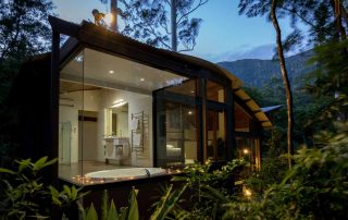 Rainforest Canopy Bungalow has a sunken double spa bath with floor-to-ceiling rainforest on three sides