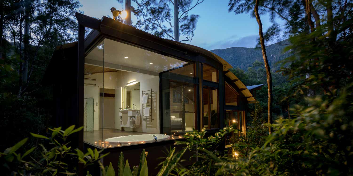 Rainforest Canopy Bungalow has a sunken double spa bath with floor-to-ceiling rainforest on three sides